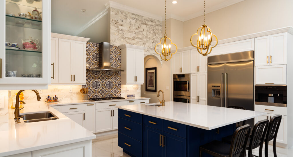 White Kitchen Design by Valley Construction and Restoration - Beautiful luxury home kitchen with white cabinets.